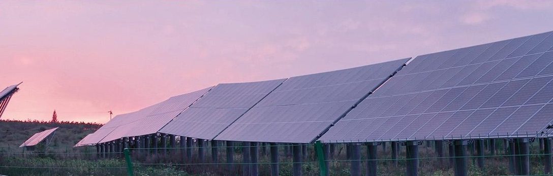 Solar panels at sunset
