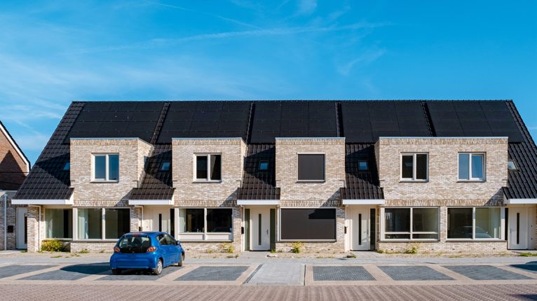 Row of modern houses with solar panels